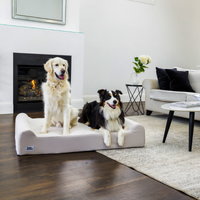 Our Aus Sheppard and a Labrador on the Snug Society Dog Bed